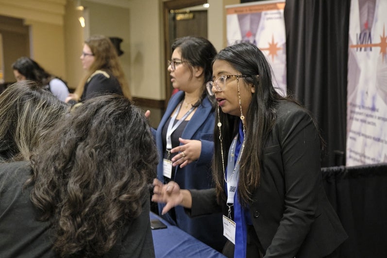 Networking at WIA's Exhibit