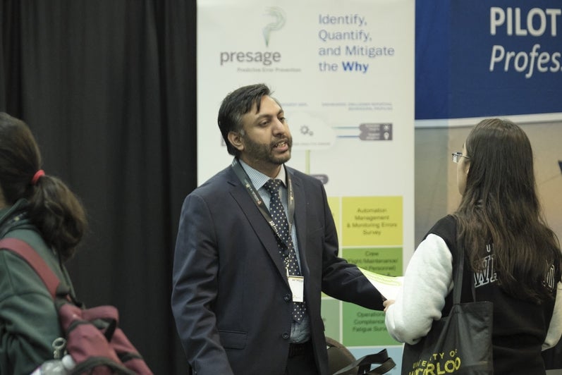 Networking at Presage's Exhibit